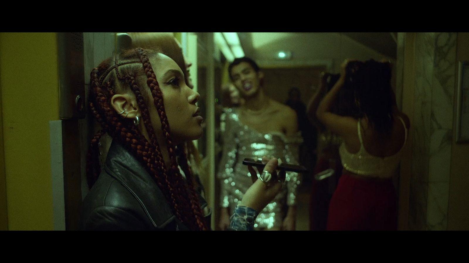 a group of women standing in a bathroom next to each other