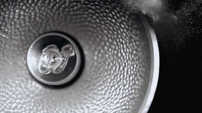 a close up of a pan with steam coming out of it