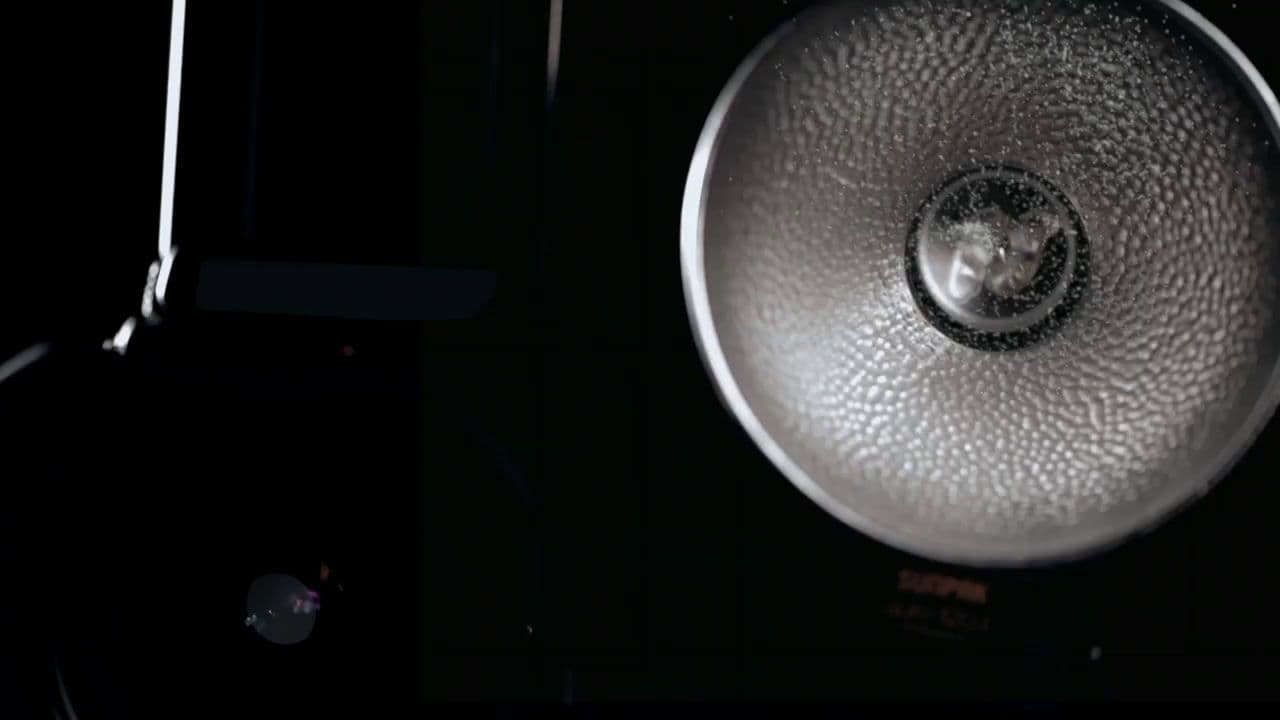 a close up of a metal object in the dark