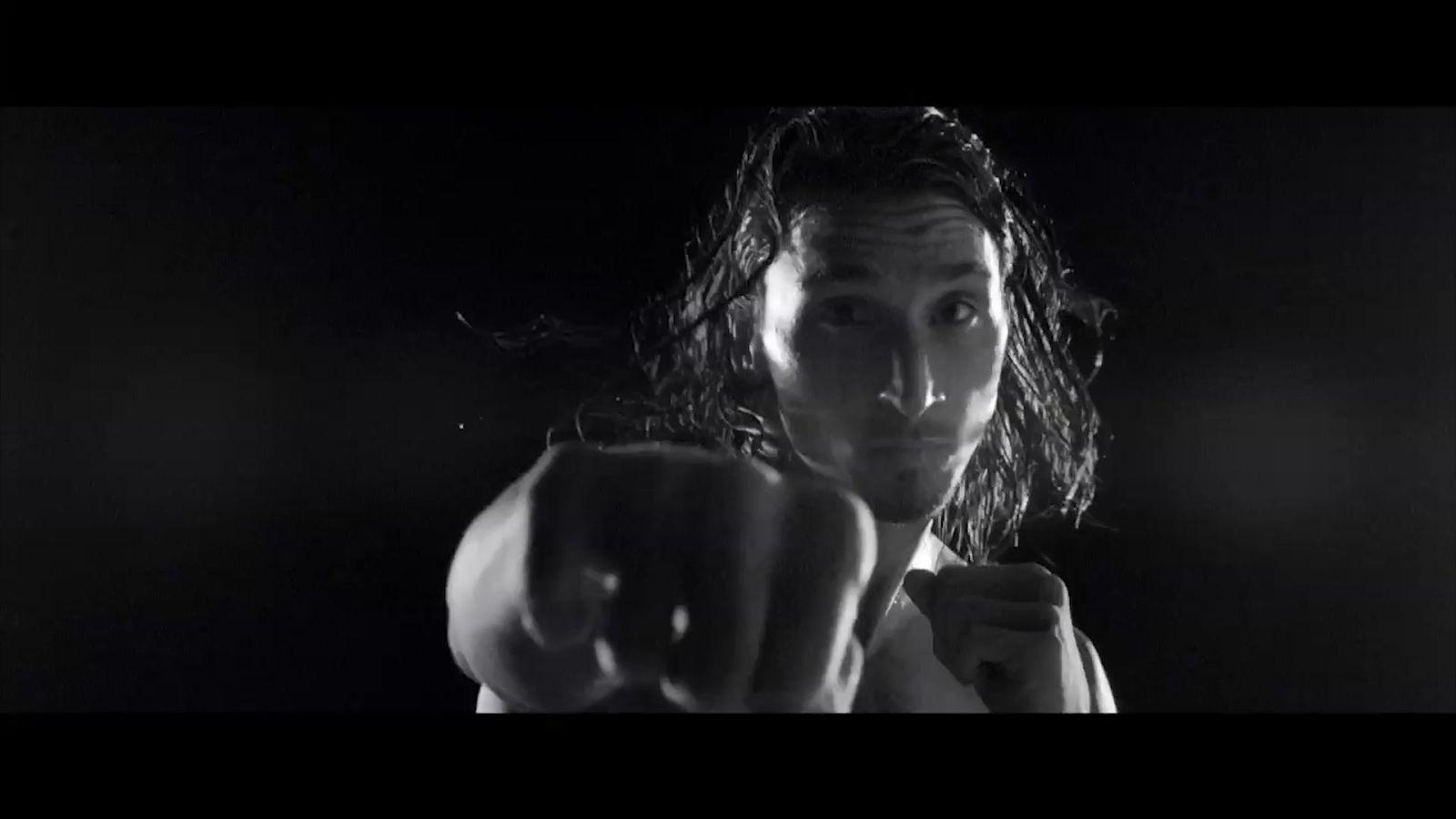 a woman pointing a finger at the camera