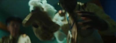 a blurry photo of a person holding a cell phone