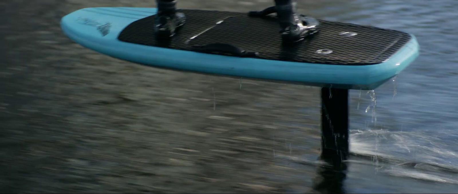 a close up of a surfboard in the water