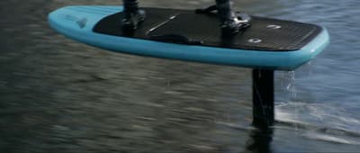 a close up of a surfboard in the water