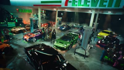 a bunch of cars are parked in a garage