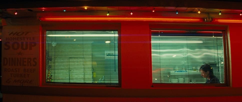 a person is looking out of a window