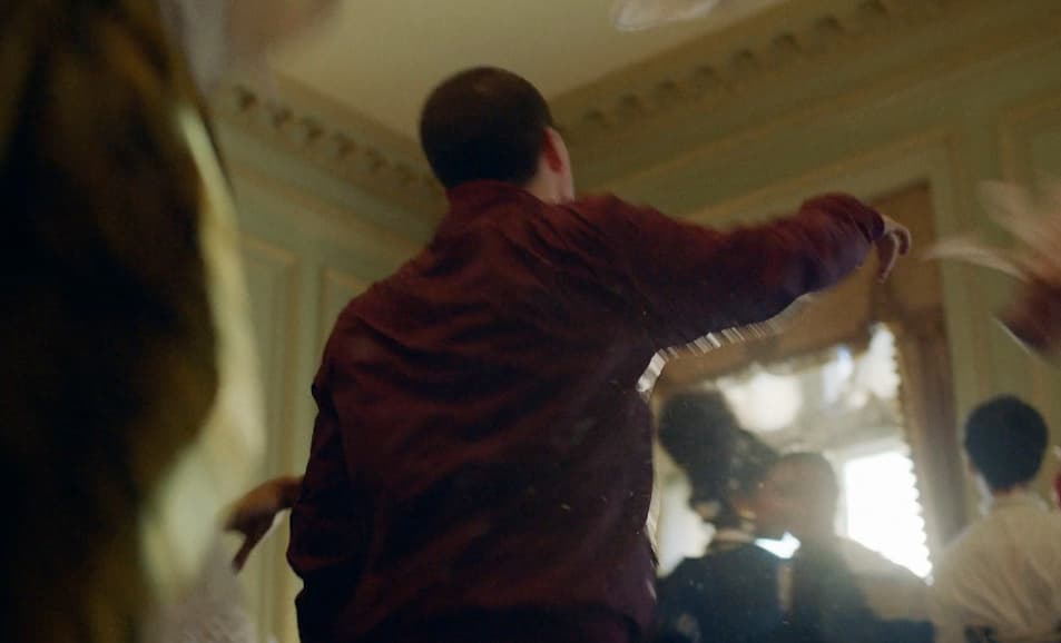 a group of people dancing in a room