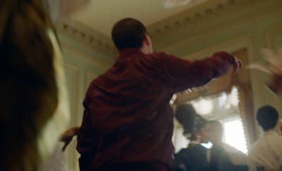 a group of people dancing in a room
