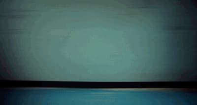 a blurry photo of a body of water