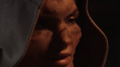 a close up of a person wearing a hoodie