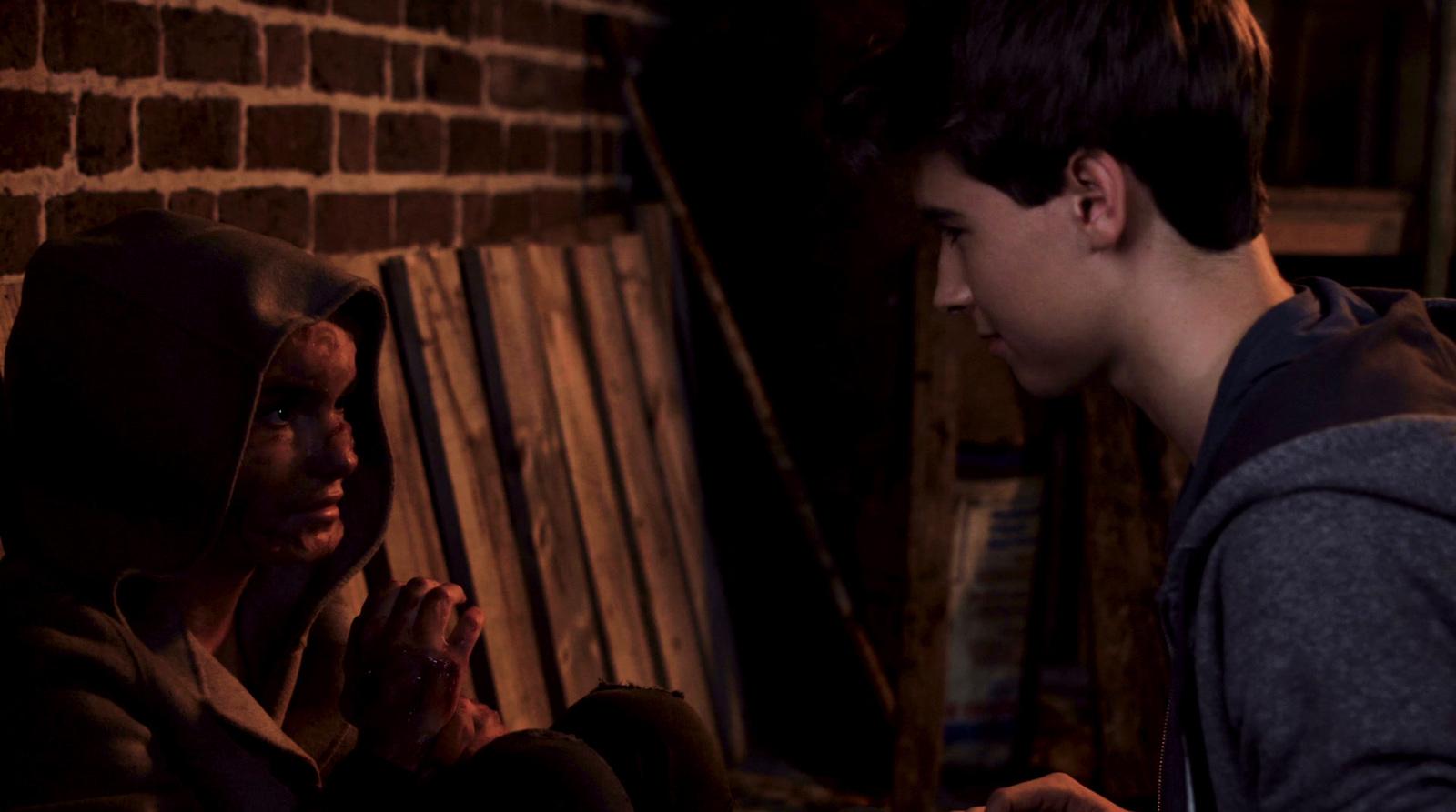 a man and a woman sitting next to each other