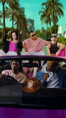a group of people sitting in a car