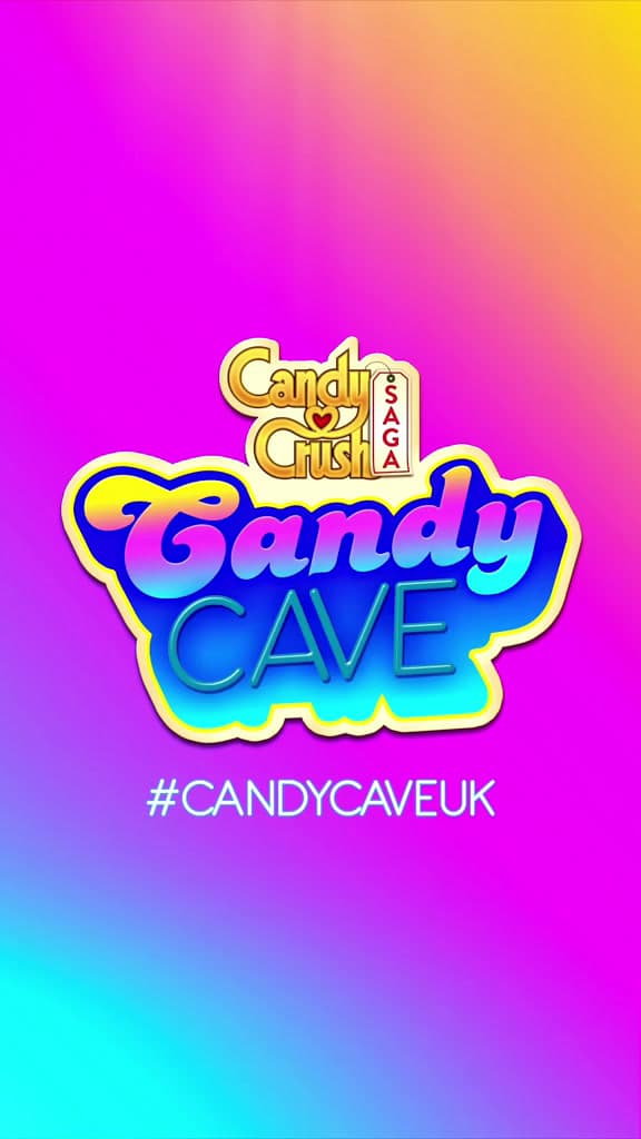 the candy cave logo on a colorful background