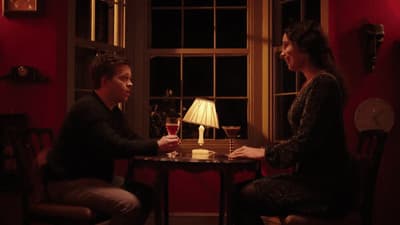 a man and a woman sitting at a table