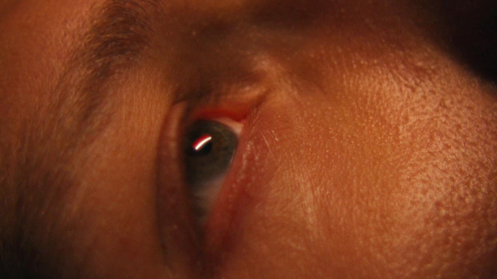 a close up of a person's left eye