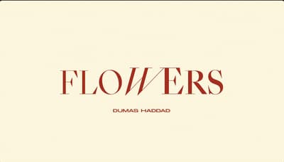 a red and white photo with the words flowers on it
