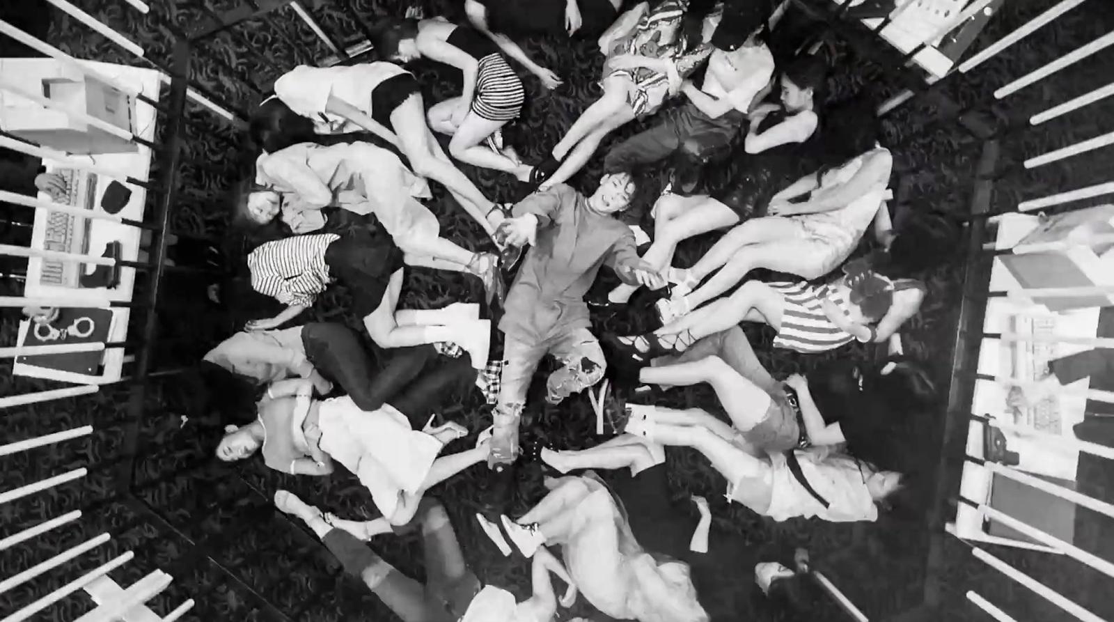 a black and white photo of a group of people
