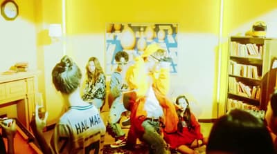 a group of people sitting in a room