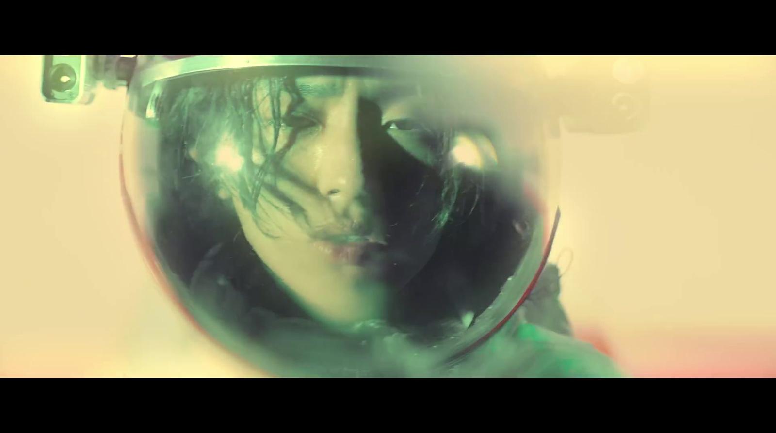 a man in a space suit with a helmet on