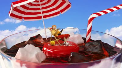a woman sitting on top of a red and white umbrella