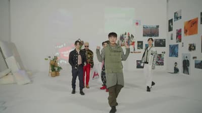 a group of people standing next to each other