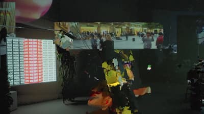 a group of people standing in a room