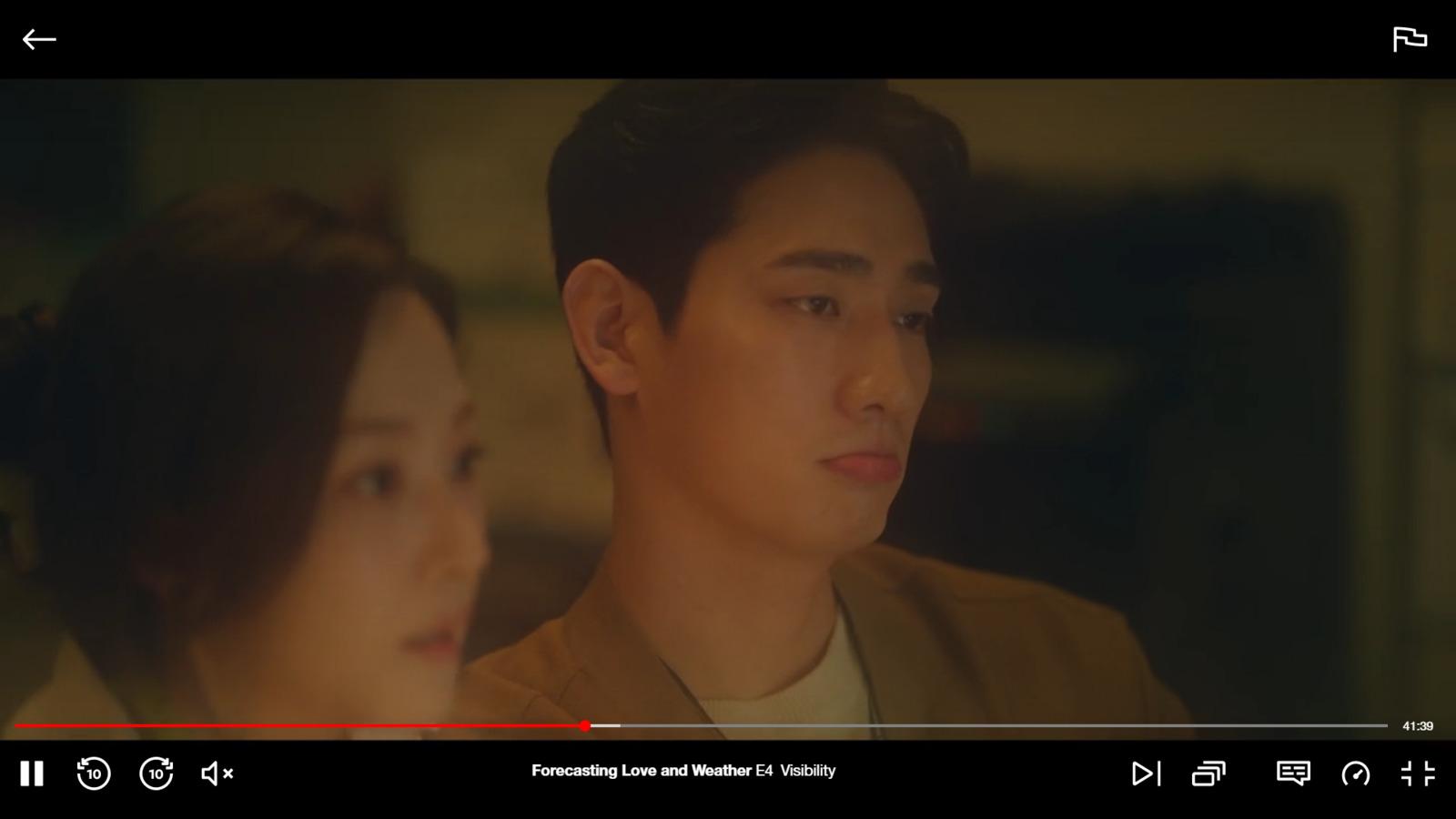 a man and a woman staring at each other