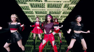 a group of young women dancing on a stage