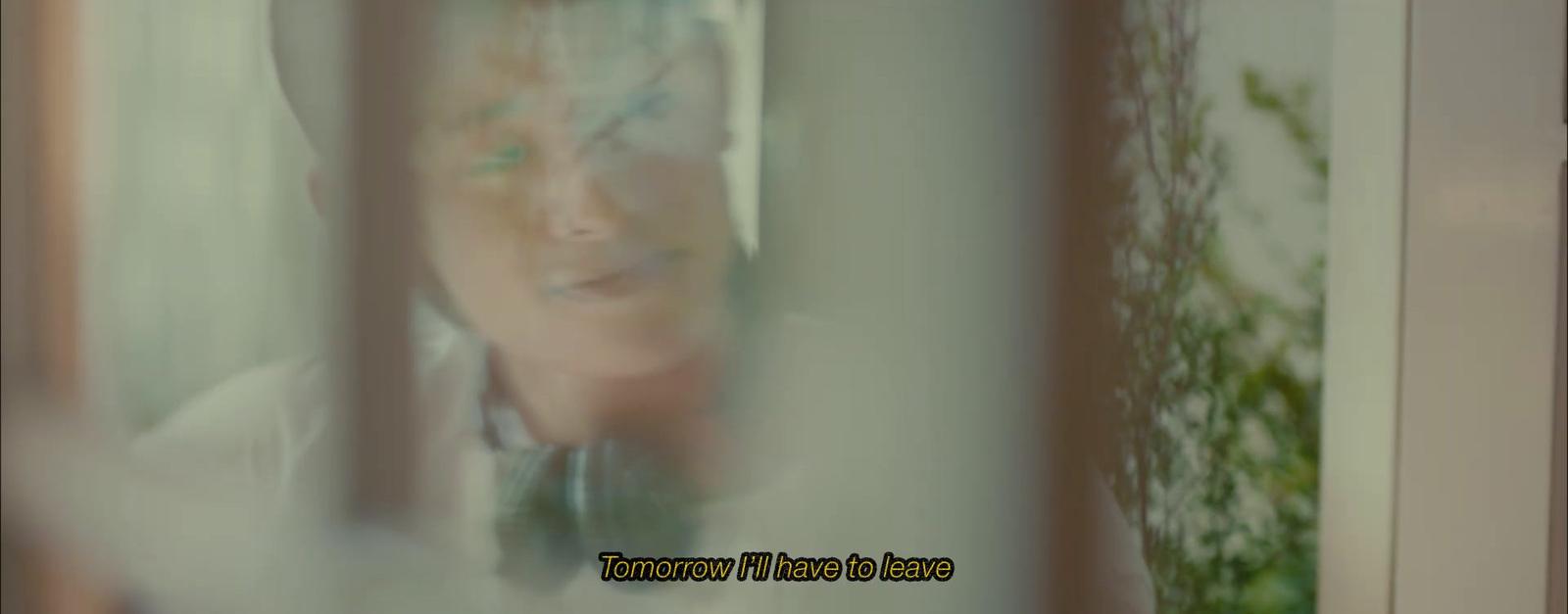 a blurry photo of a man in a bow tie