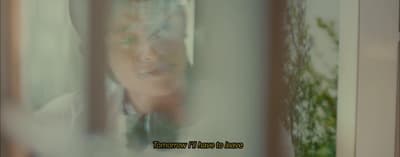 a blurry photo of a man in a bow tie