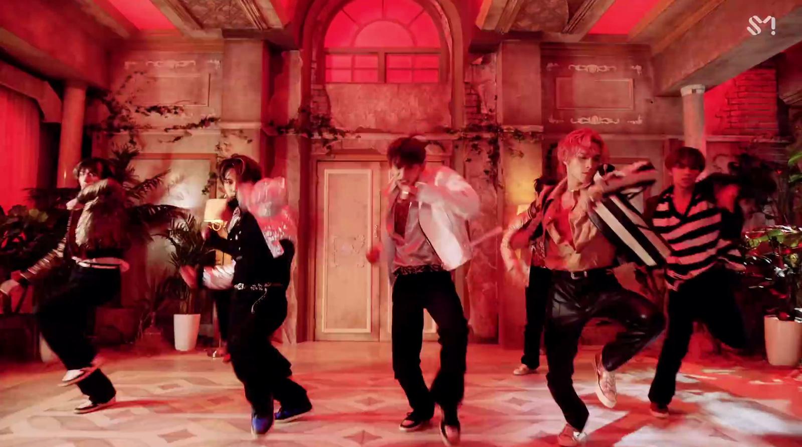 a group of people dancing in a room