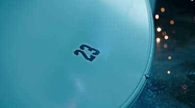 a close up of a disc on a table