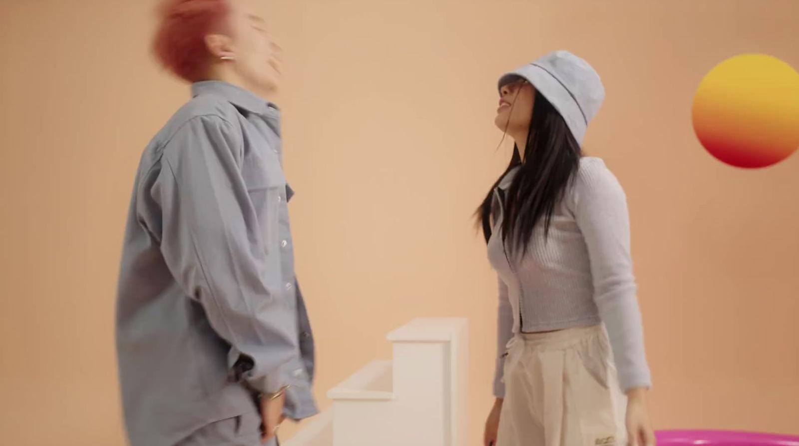a man and a woman standing next to each other