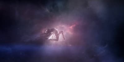a person in a space suit floating in the air