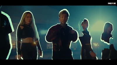 a group of people standing next to each other