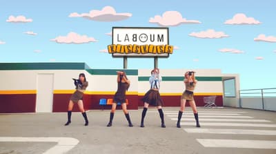 a group of women standing on top of a parking lot
