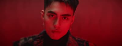 a man with a red light on his face