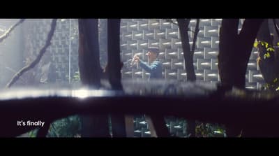 a man taking a picture of himself in a mirror
