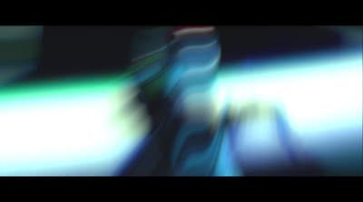 a blurry photo of a tie on a table