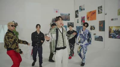 a group of young men standing next to each other