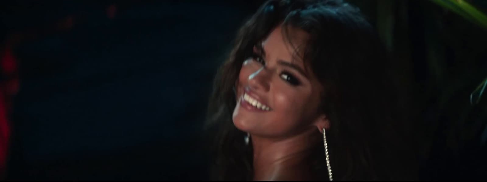 a close up of a person with long hair