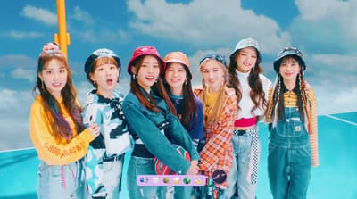 a group of young women standing next to each other