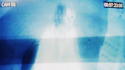 a television screen with a picture of a ghost on it