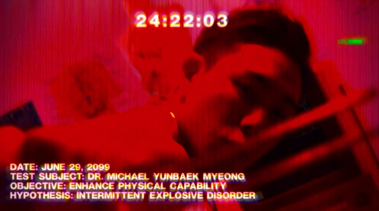 a screen shot of a man in a red room