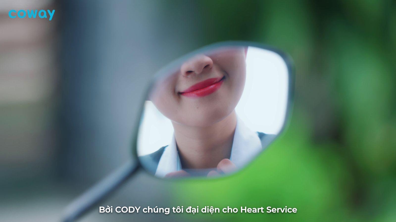 a woman's face is reflected in a mirror