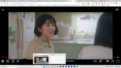 a screen shot of a woman in a classroom