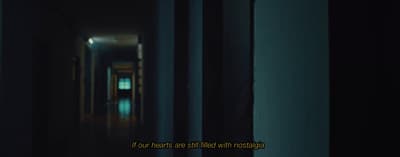 a hallway with a quote on the wall