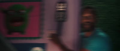 a blurry image of a woman brushing her teeth