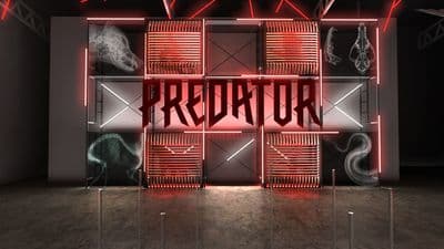 a room with a neon sign that reads predator