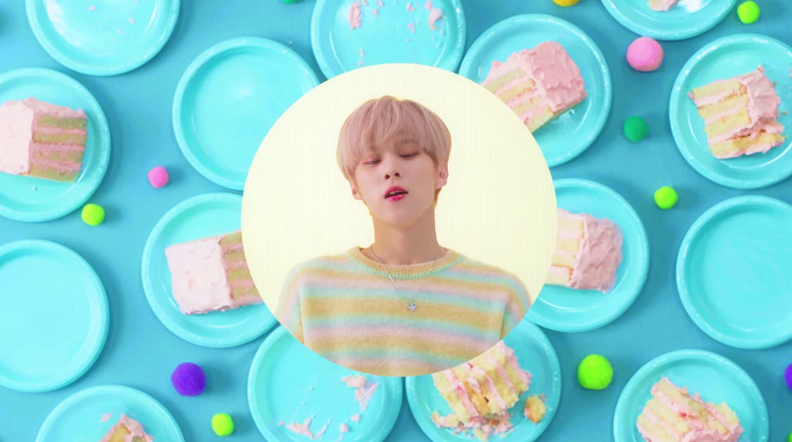 a picture of a person with a cake in front of them