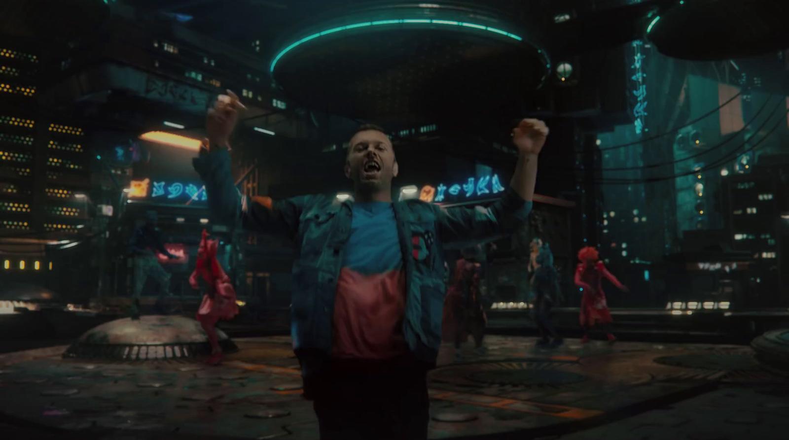 a group of people in a futuristic city